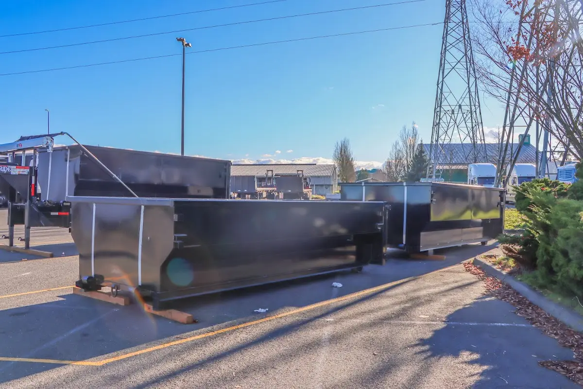 Roll-off dumpster ready for waste disposal at job site for Roofing Dumpster Rental in McAlester